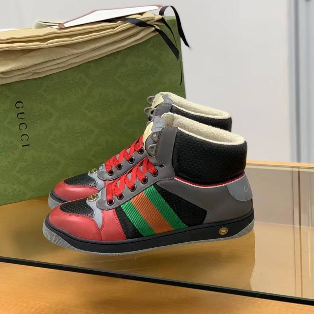 Gucci High-top Distressed sneakers