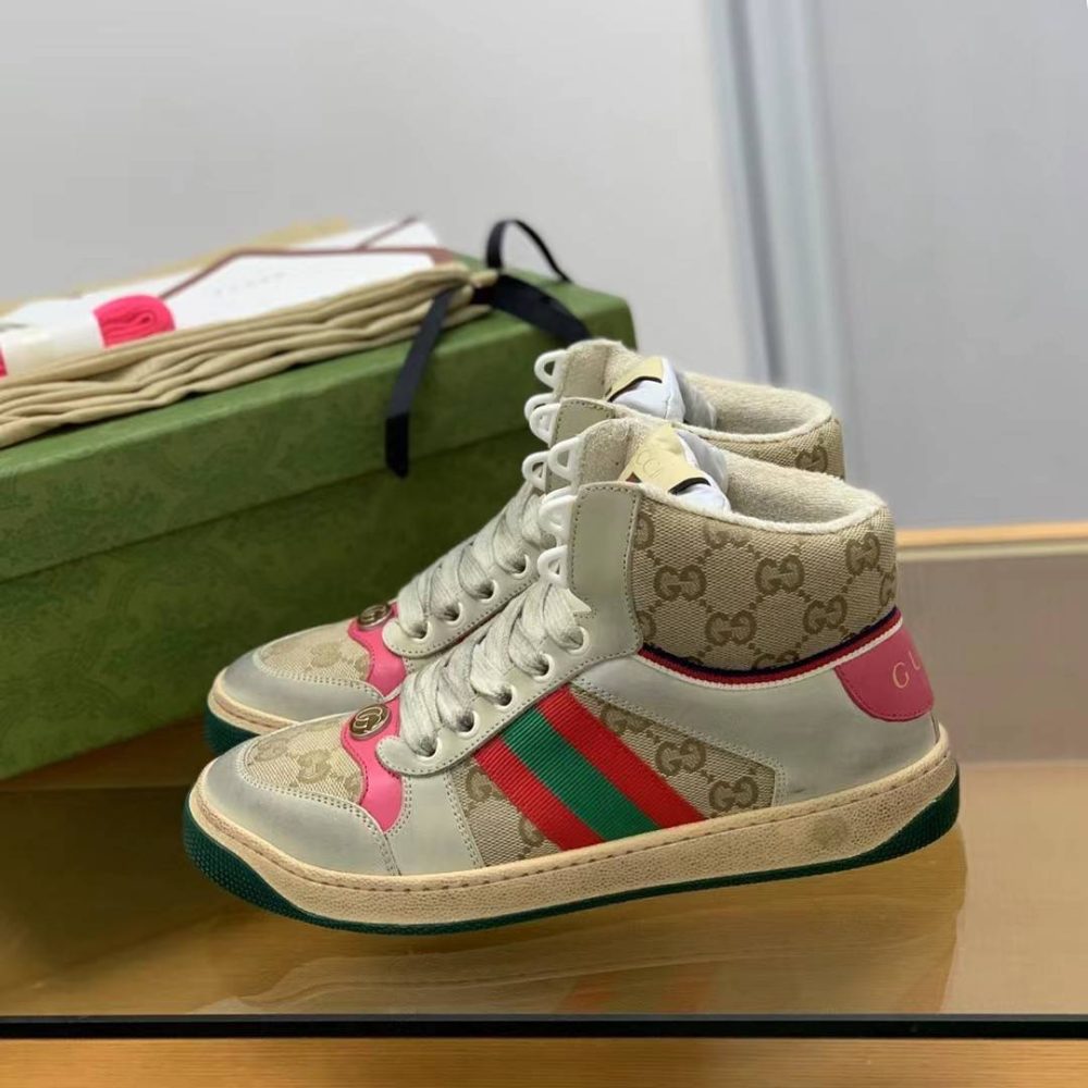 Gucci High-top Distressed sneakers