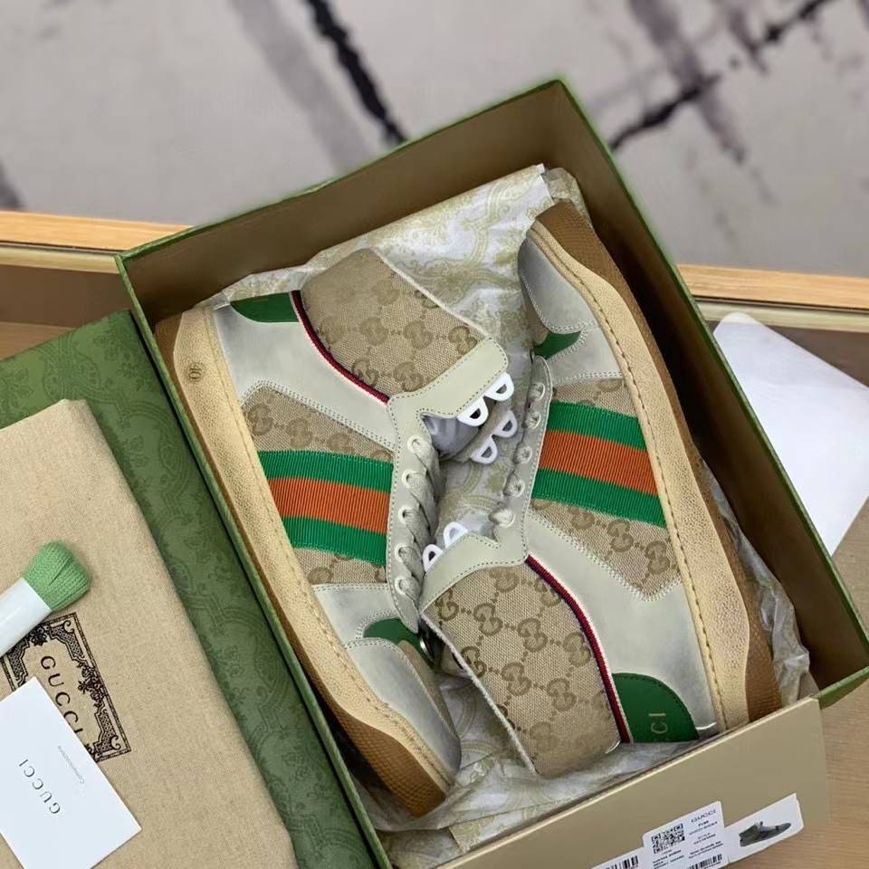 Gucci High-top Distressed sneakers