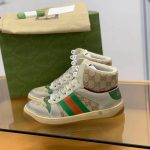 Gucci High-top Distressed sneakers