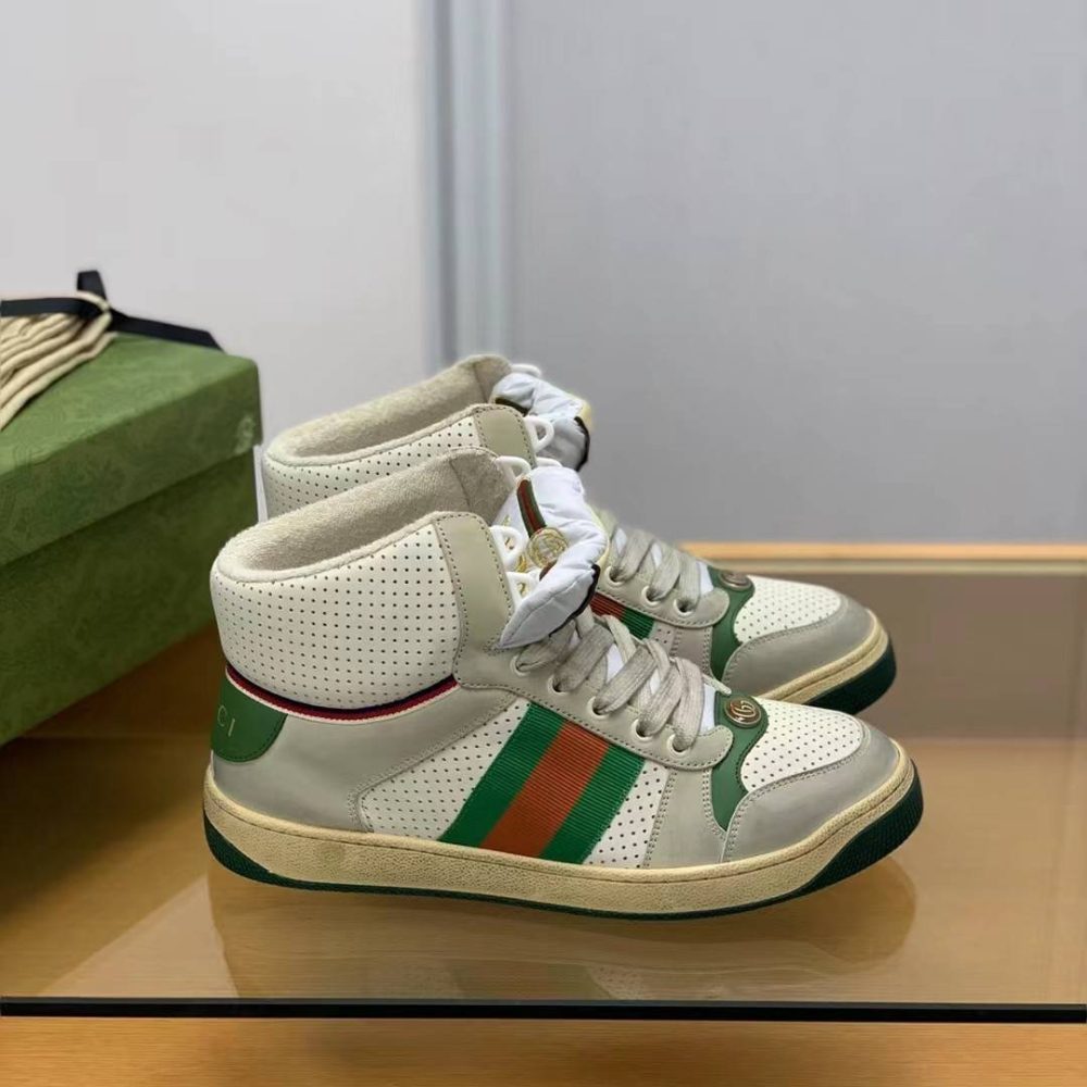 Gucci High-top Distressed sneakers