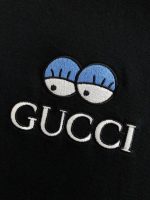 Gucci Floral neckline embroidered polo shirt with cartoon lettering